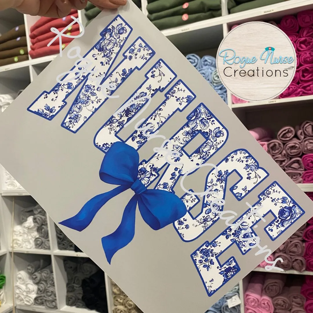 Blue Floral Nurse With Blue Bow Graphic T-shirt, Cute Floral Nurse Shirt, Nurse Gift, flowers and Bow Nurse T-shirt. Pretty Bow Nurse Shirt