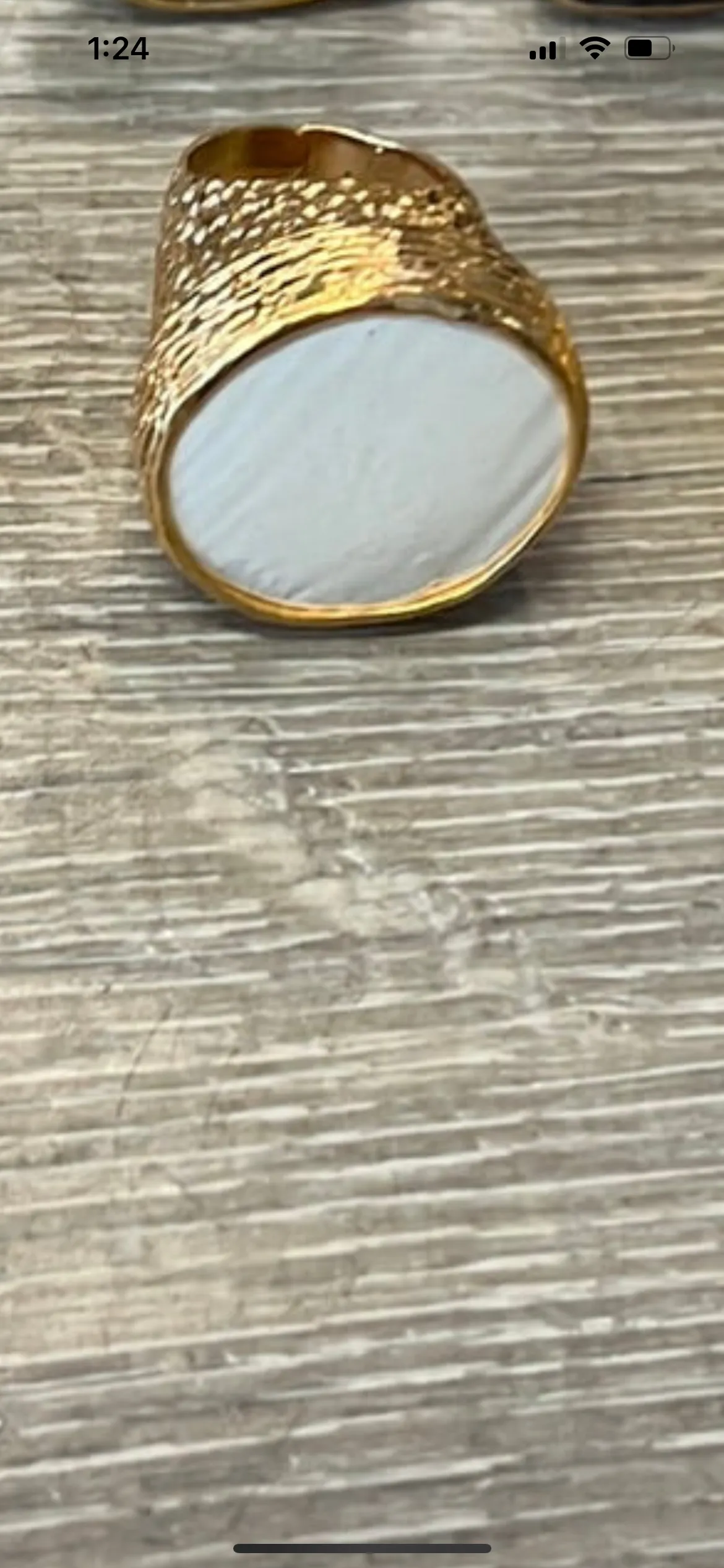 Cocktail pounded gold ring