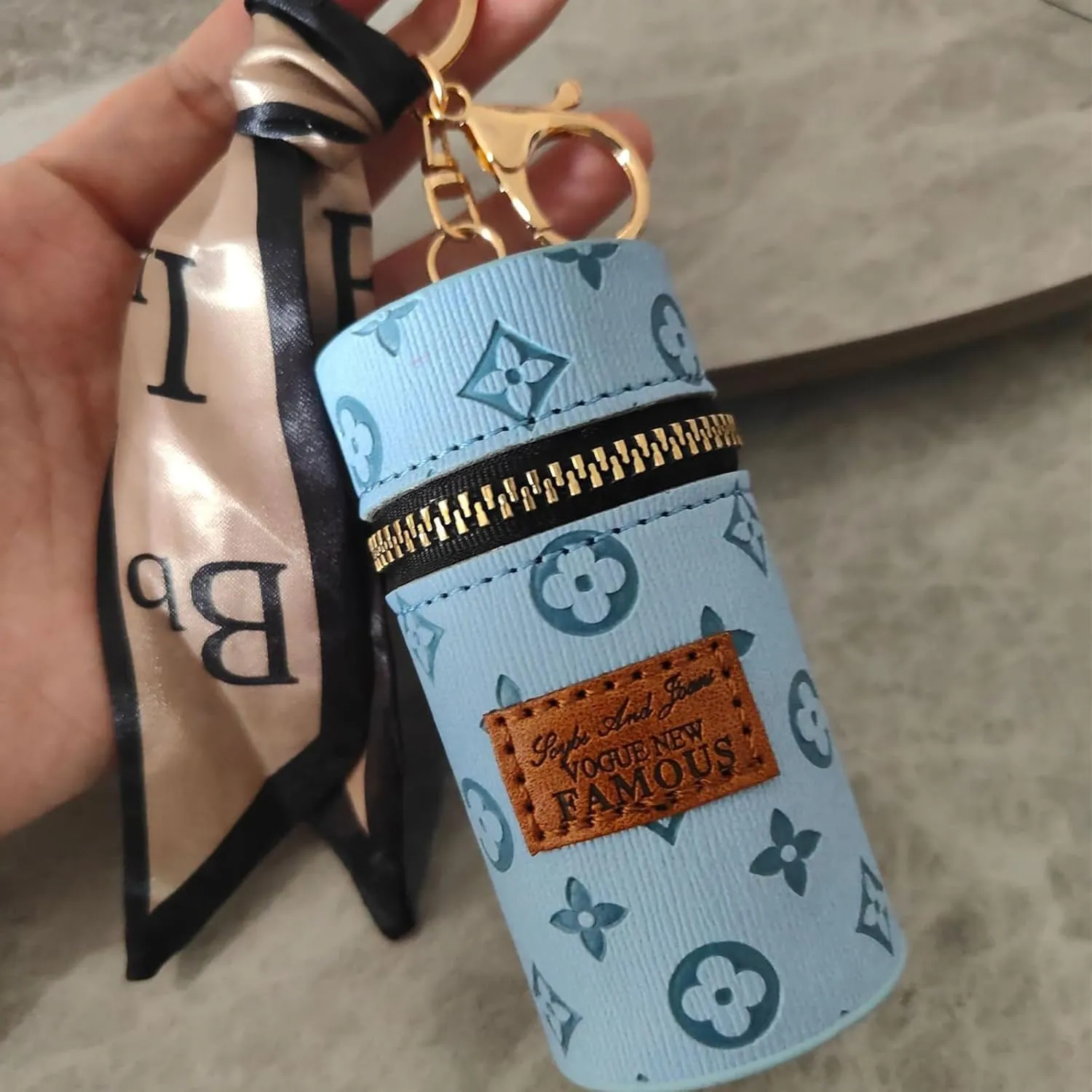 Mini Bucket Bag for Lipsticks - Portable Embossed Makeup Pouch with Drawstring, Cute Keychain Coin Purse for Women, Travel Cosmetic Organizer (Light blue)
