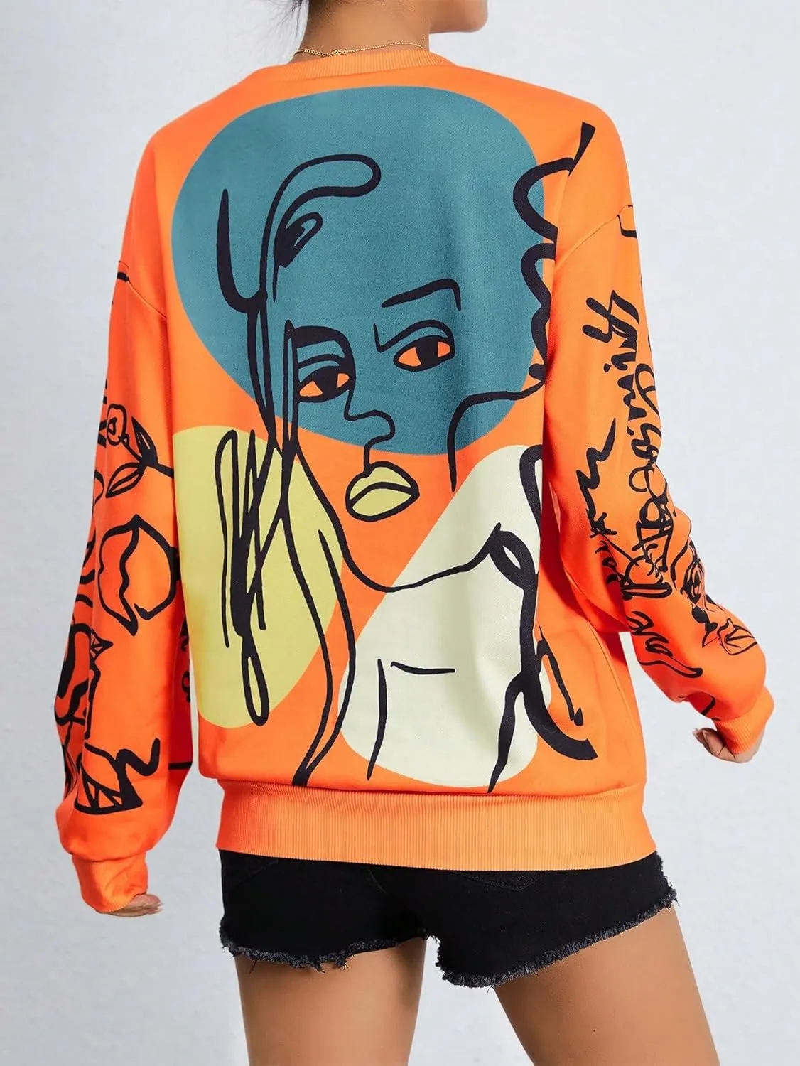 WDIRARA Women's Figure Graphic Print Sweatshirt Round Neck Long Sleeve Contrast Color Graffiti Pullovers