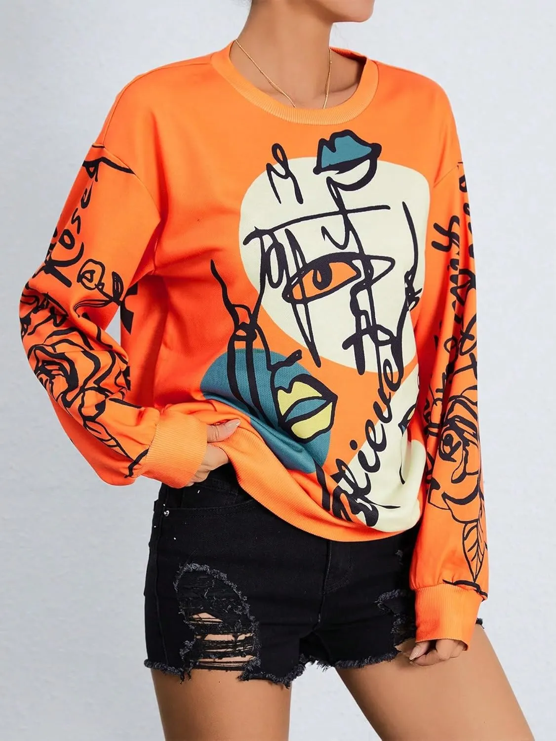 WDIRARA Women's Figure Graphic Print Sweatshirt Round Neck Long Sleeve Contrast Color Graffiti Pullovers