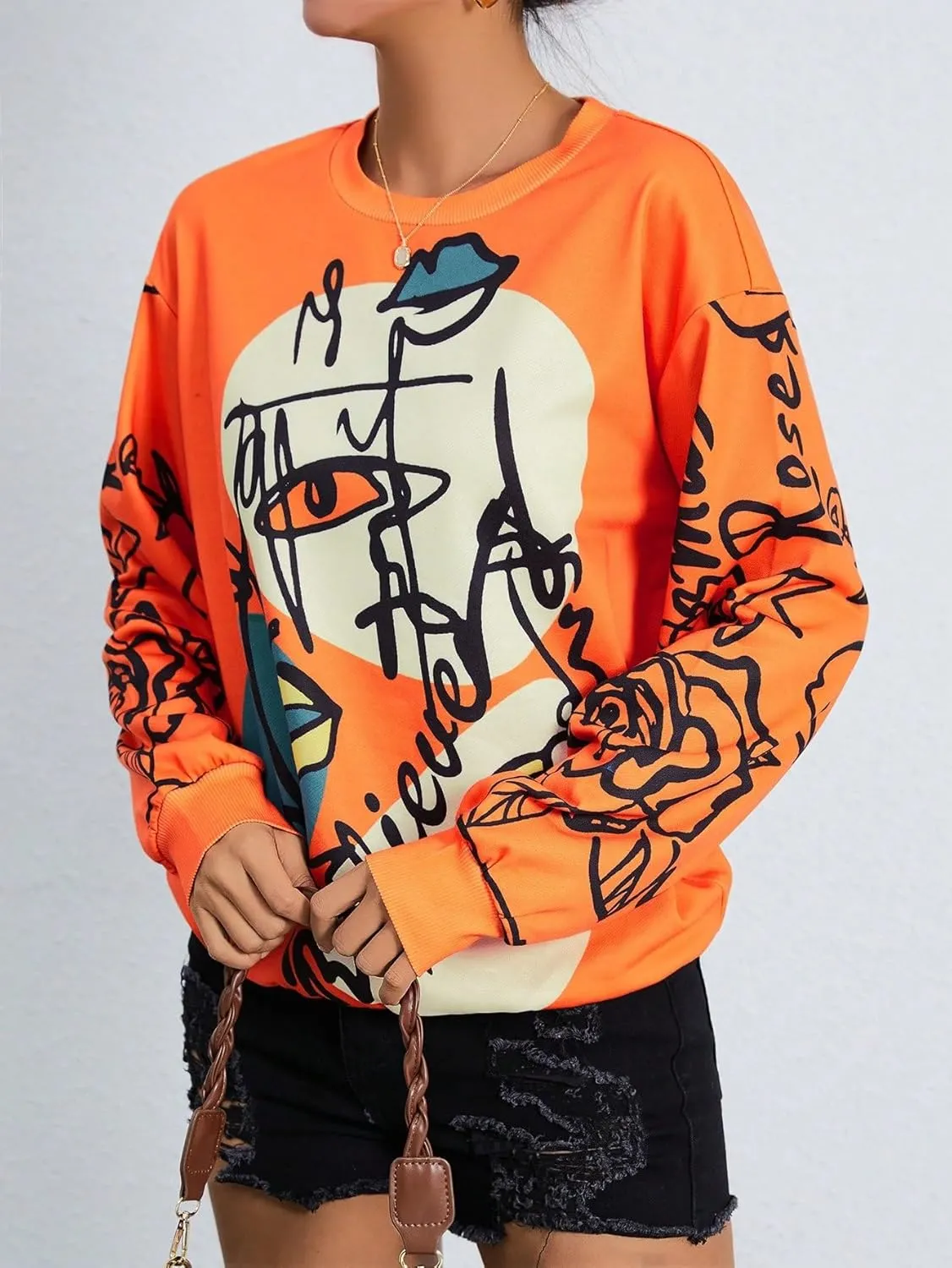 WDIRARA Women's Figure Graphic Print Sweatshirt Round Neck Long Sleeve Contrast Color Graffiti Pullovers
